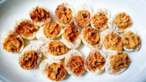 Spicy Korean Deviled Eggs on a white platter
