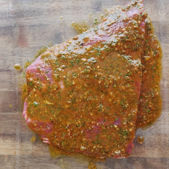 Carne asada marinating