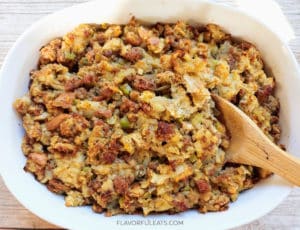 A white oval baking dish filled with Mom's Sausage Stuffing