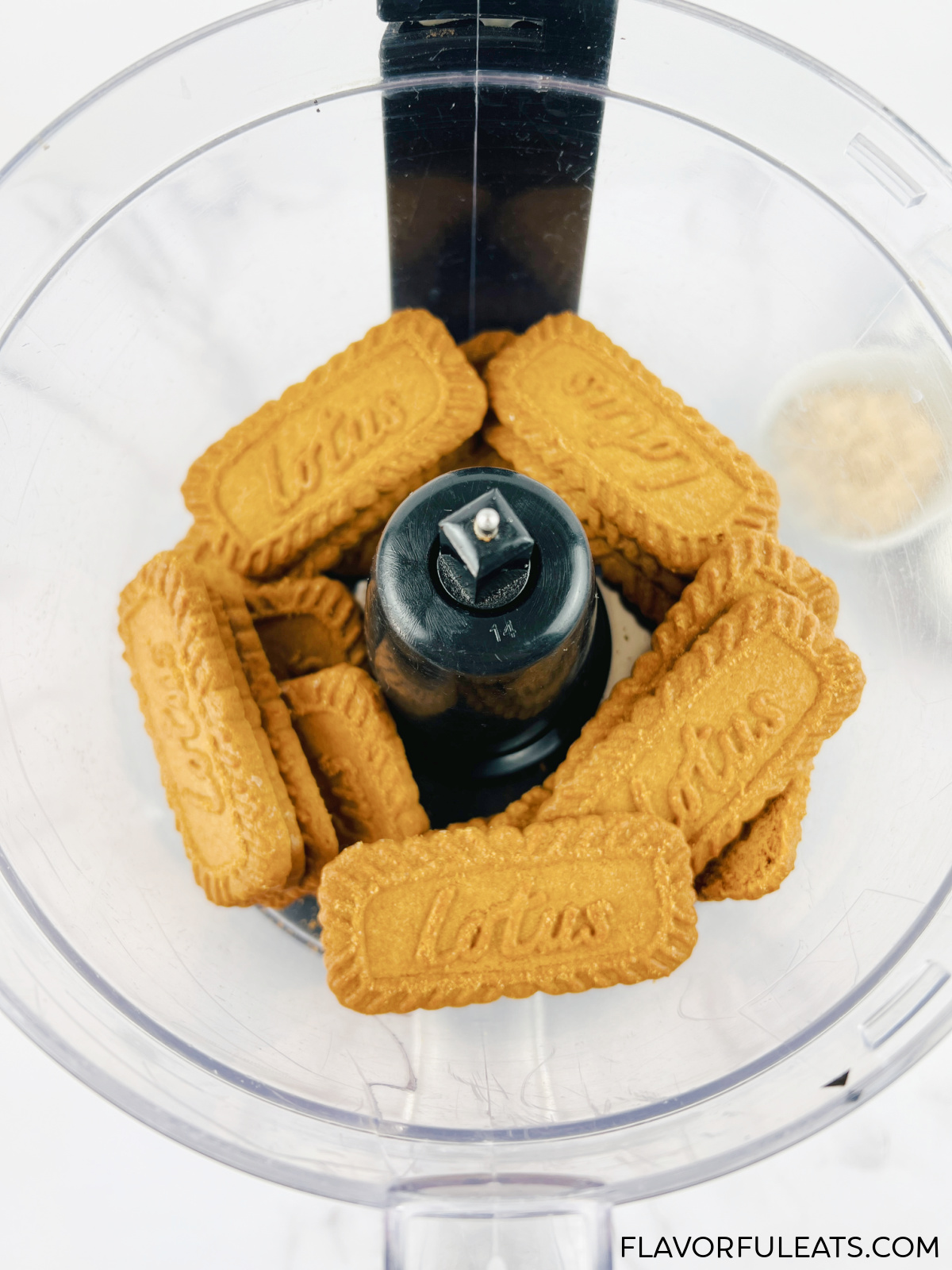 Biscoff cookies in a food processor before they're blended.