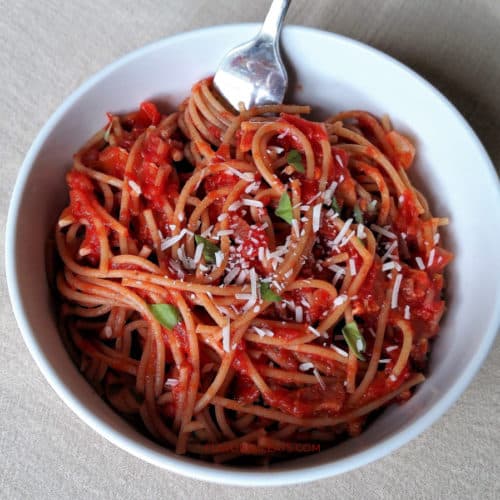 A bowl of spaghetti with Amatriciana Pasta Sauce.