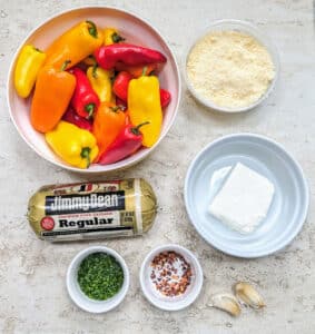 Ingredients needed to make these Sausage Stuffed Sweet Mini Peppers
