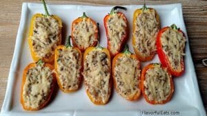 Sausage Stuffed Sweet Mini Peppers on a white serving platter