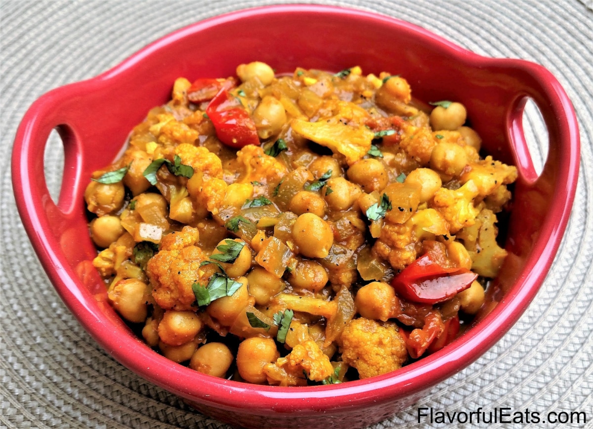 Chickpea Cauliflower Curry in a red bowl.