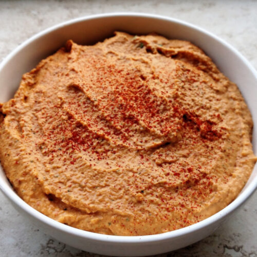 Spicy Chipotle Hummus in a white bowl.