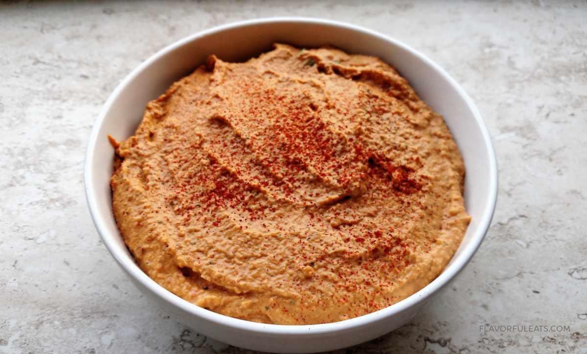 Spicy Chipotle Hummus in a white bowl.