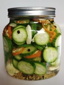A large jar of Habanero Garlic Pickles.