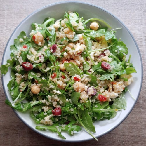 Mediterranean Arugula Quinoa Salad in a large bowl.