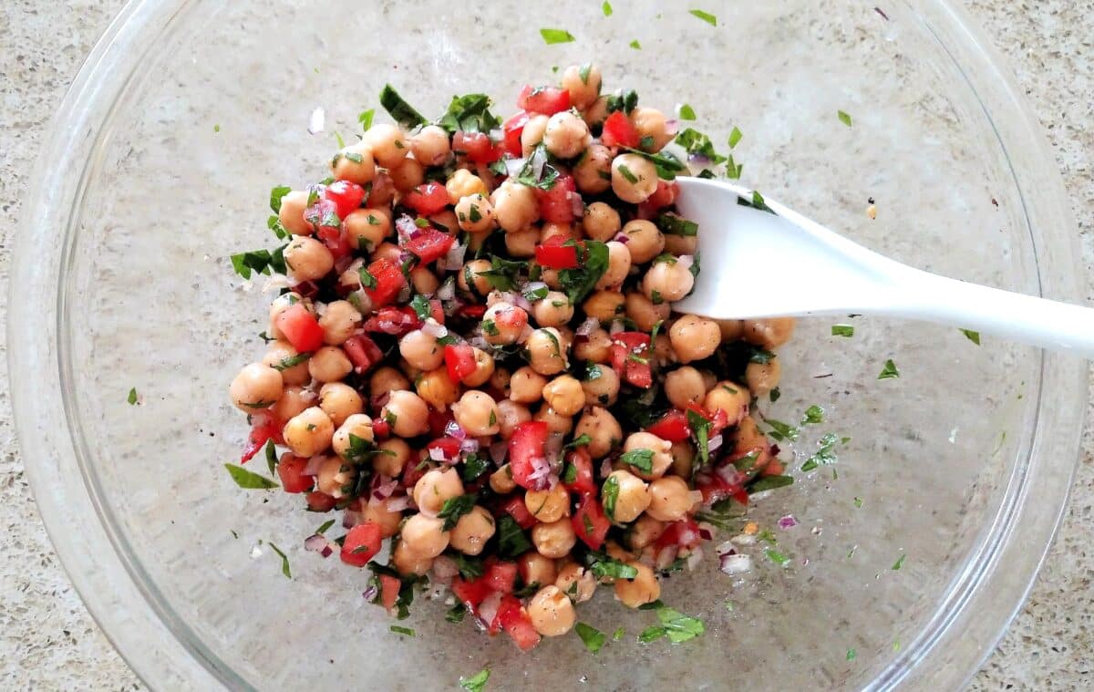 Mediterranean Balela Salad in a glass bowl.