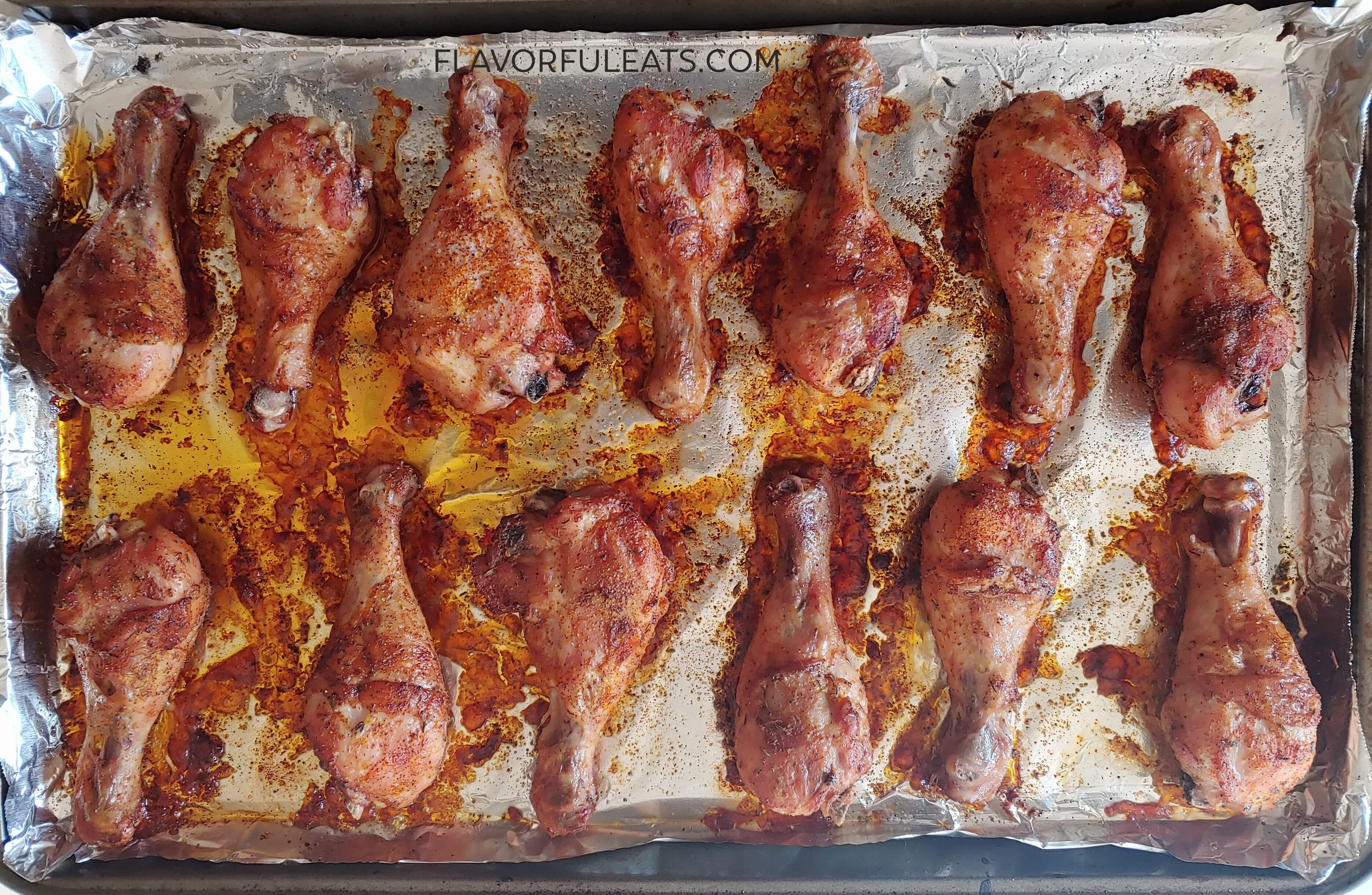 Spicy Baked Chicken Drumsticks on a sheet pan after they've baked.