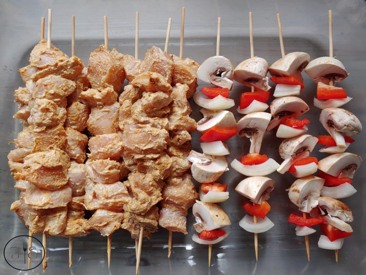 Aji Amarillo Yogurt Marinated Chicken Kabobs assembled, before they've cooked.