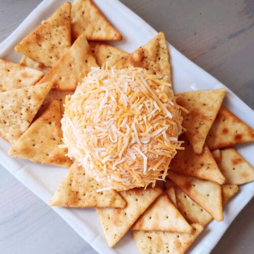 Ghost Pepper Cheese Ball plated with crackers around it.