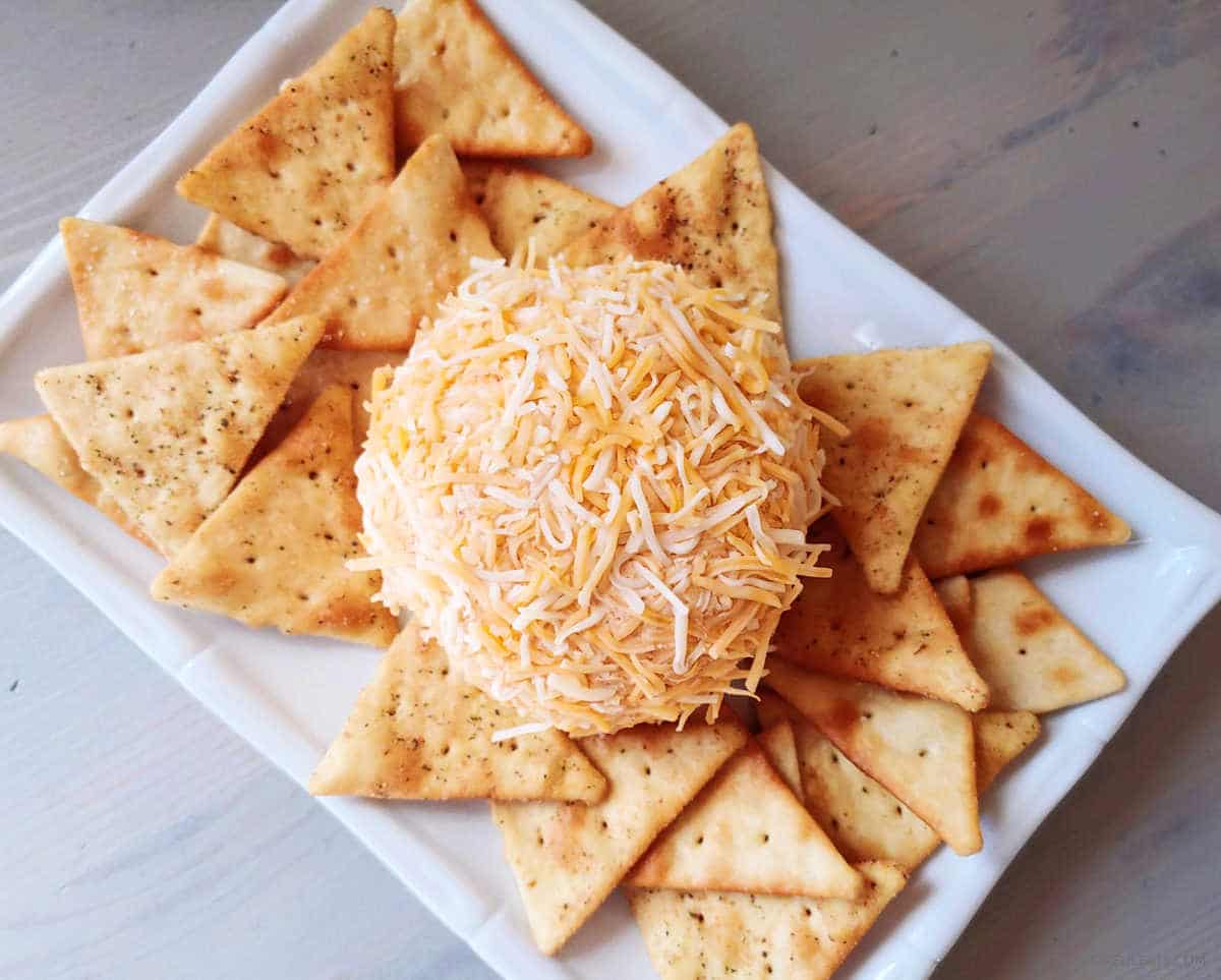 Ghost Pepper Cheese Ball plated with crackers around it.