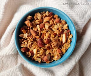 Cinnamon Almond Granola in a blue bowl.