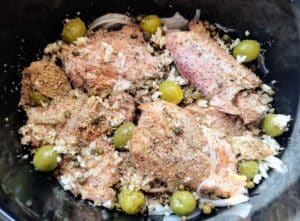 Slow Cooker Chicken Provencal in the slow cooker without the butter, before it has cooked.