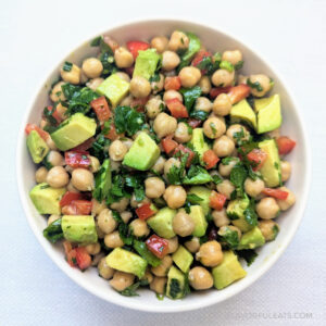 Chickpea Avocado Salad in a white bowl