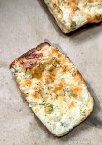 A close up of a Dill Pickle Puff Pastry Appetizer after it has been baked.