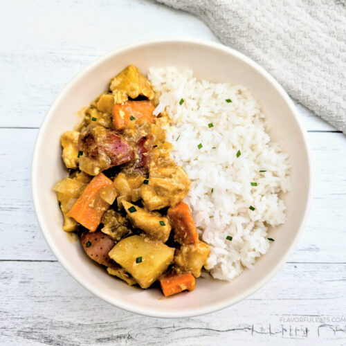 Slow Cooker Japanese Chicken Curry in a white bowl with rice