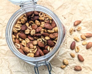 Spicy Curry Roasted Nuts in a glass jar