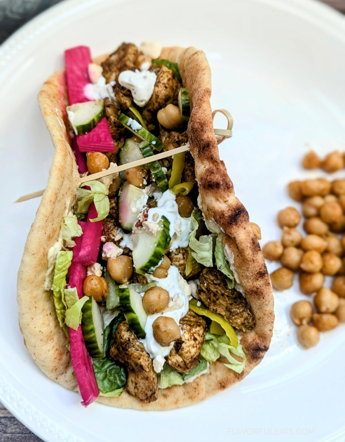 Close-up of Sheet Pan Za'atar Chicken & Chickpeas in a flatbread