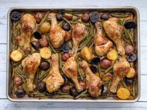 Sheet Pan Chicken Drumsticks, Potatoes & Green Beans on sheet pan.