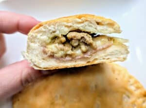 The inside of a Cuban Stuffed Biscuit Hand Pie