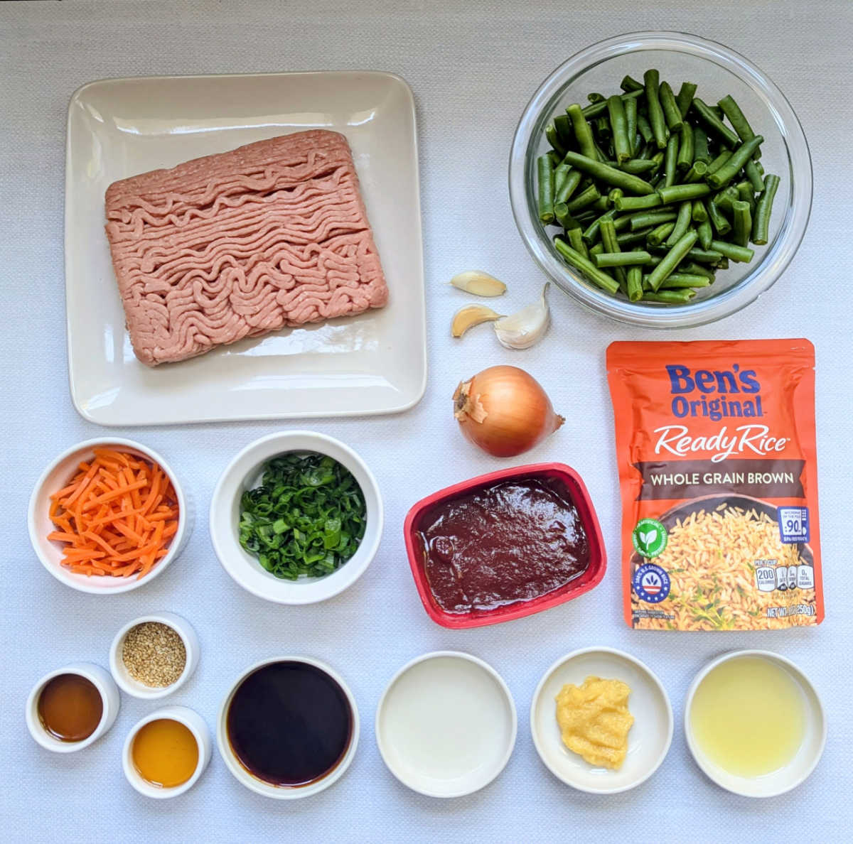 A photo of the ingredients needed to make Gochujang Ground Turkey, Rice & Green Bean Skillet.
