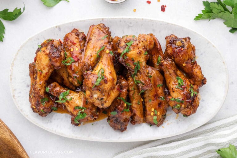 Air Fryer Honey Sriracha Chicken Wings on a serving platter.