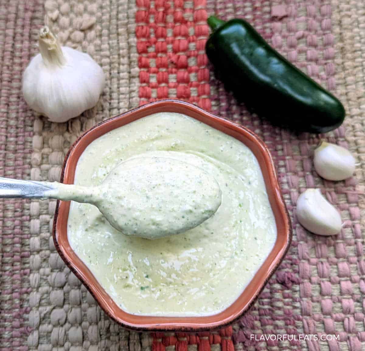 Roasted Jalapeno Aioli in a bowl with a spoon.