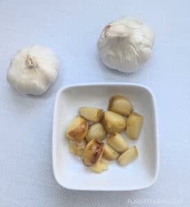 Air Fryer Roasted Garlic in a small plate.