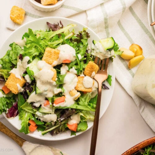 Creamy Roasted Garlic Dressing on a salad.