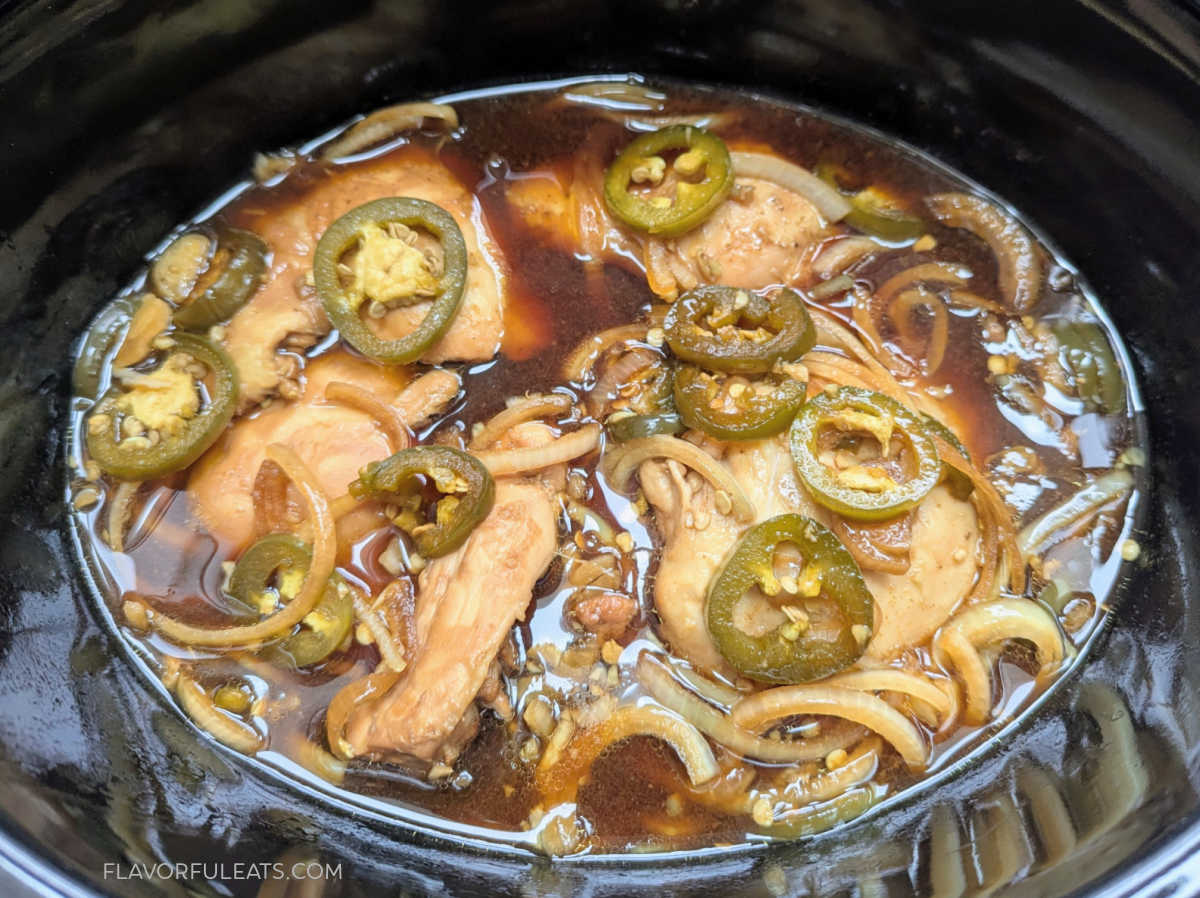 Slow Cooker Soy Jalapeno Chicken in the slow cooker after it's cooked.