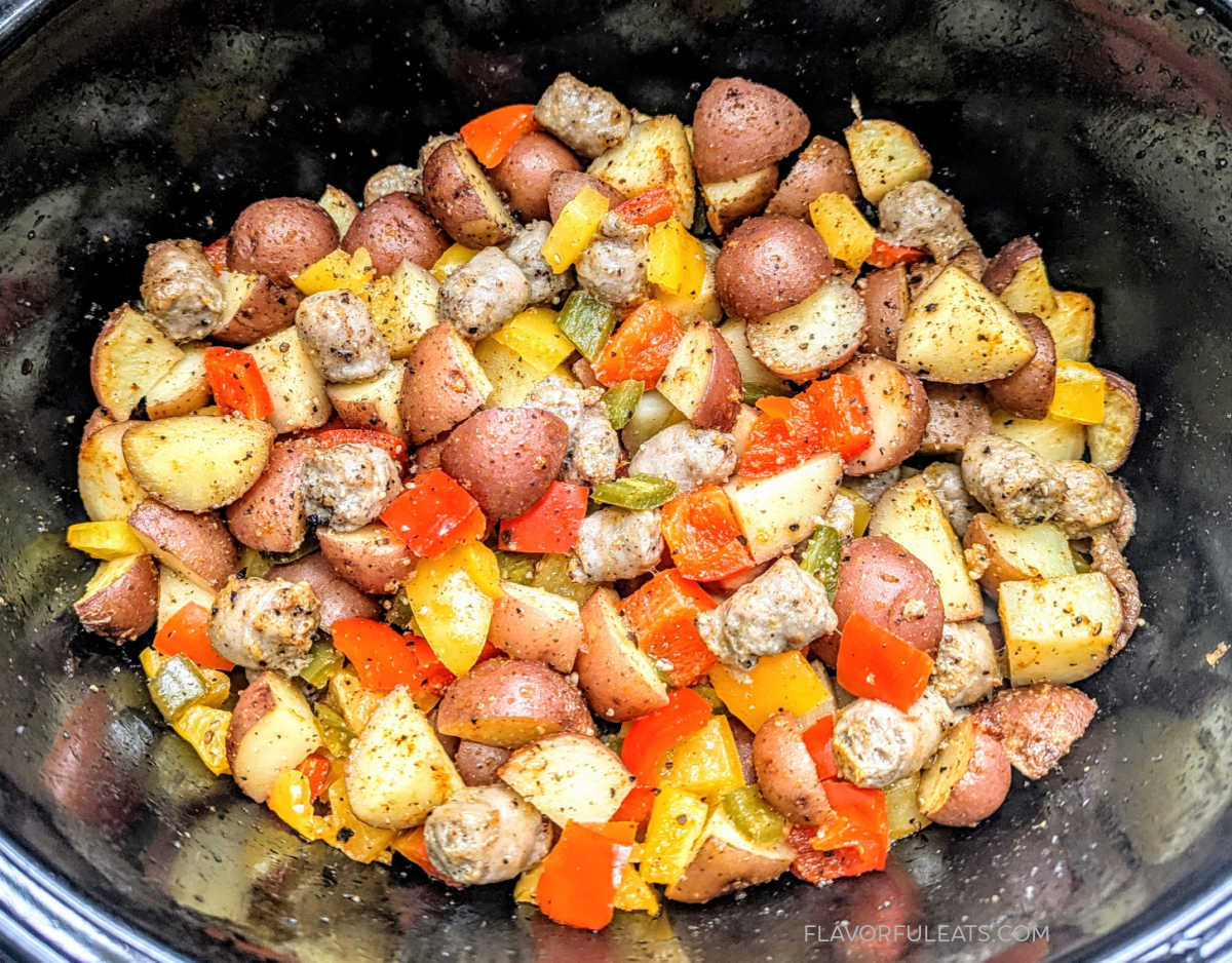 Slow Cooker Sausage Breakfast Hash after it's cooked before the cheese and scallions are added.