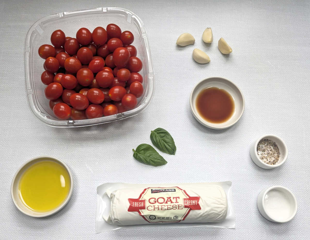 The ingredients needed to make Roasted Cherry Tomato Goat Cheese Dip.