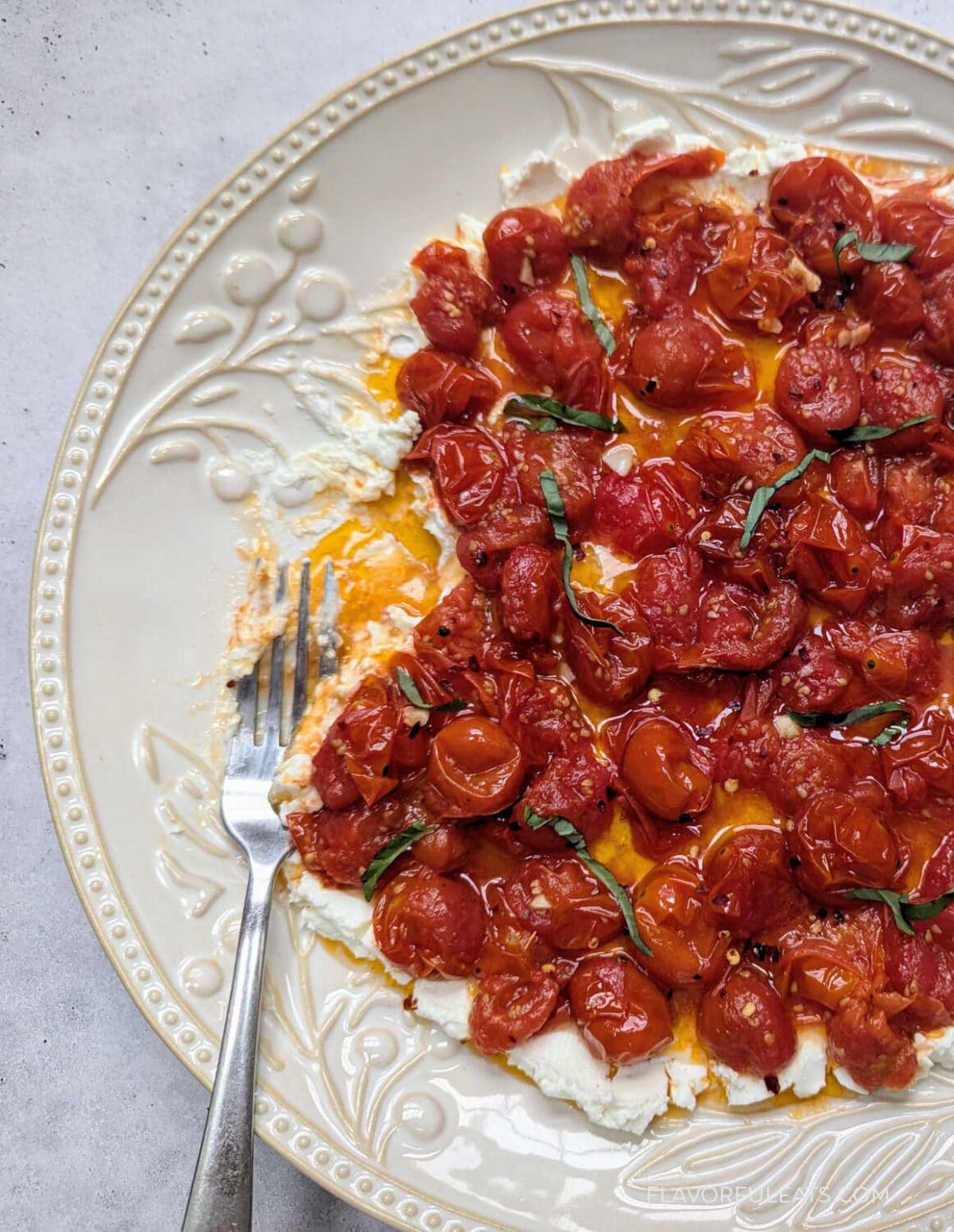 Roasted Cherry Tomato Goat Cheese Dip on a serving platter.