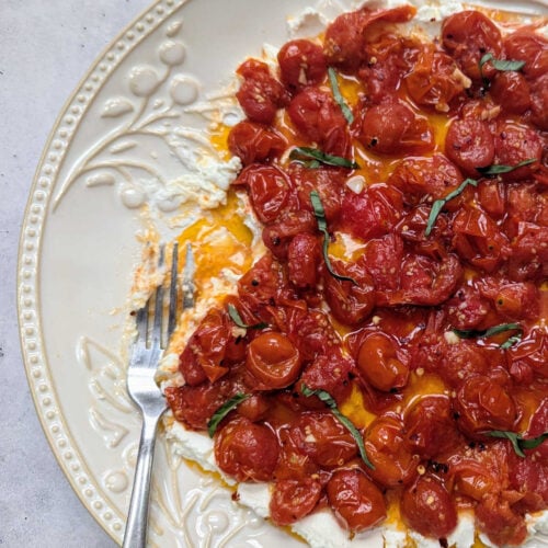 Roasted Tomato Goat Cheese Dip served on a platter.